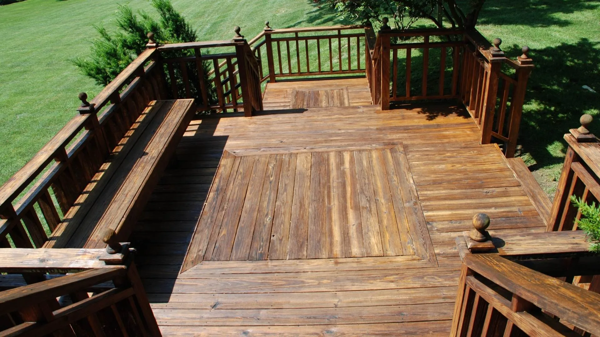 Custom deck construction with composite decking and cable railing system